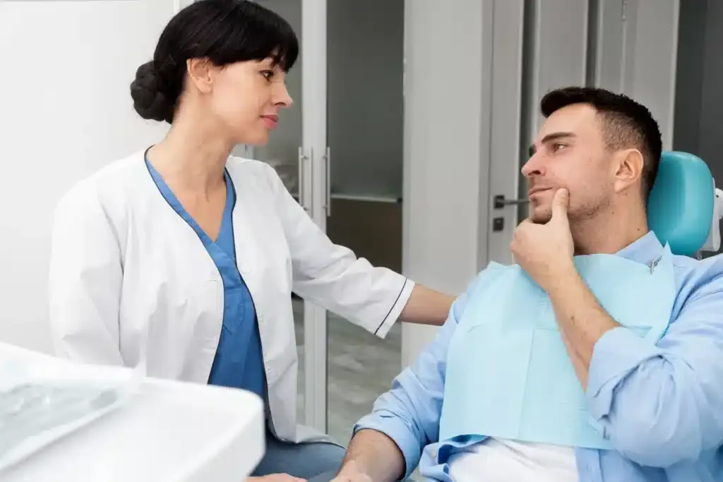 Man going to the dentist for Jaw Pain