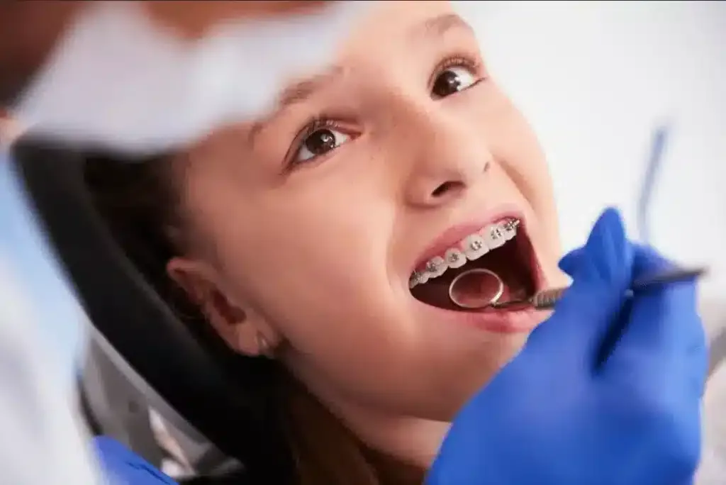 Image of a women that is in dentist hospital